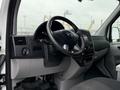 Interior view of a 2017 Mercedes-Benz Sprinter showing the steering wheel dashboard and control panel