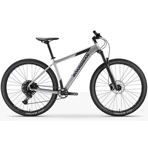 2026 Boardman MHT 8.8 Aluminium Hardtail Mountain Bike featuring a sleek silver frame wide tires and a front suspension fork