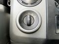 The image shows the control knob of a 2013 Ford Econoline used for adjusting the headlights and dashboard lights