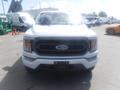 Front view of a white 2022 Ford F-150 with a black grille and Ford emblem