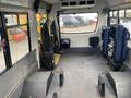 Interior of a 2016 Chevrolet Express with empty seating area and controls visible on the walls