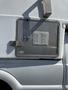 A metal service door with a vent on a 2014 Ford F-350 SD
