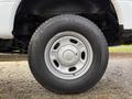 Close-up of a wheel and tire from a 2017 Ford F-350 SD showing the silver rim and Michelin tire tread