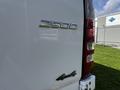 A white 2017 Mercedes-Benz Sprinter van with a detailed badge showing the model number 2500 and a 4x4 designation