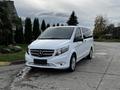 A white 2018 Mercedes-Benz Metris van is parked with a sleek front design showcasing the Mercedes logo on the grille and modern headlights