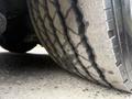 Close-up of a worn tire tread on a 2016 Grande West Vicinity bus showing distinct patterns and grooves
