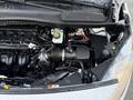 Engine bay of a 2017 Ford Transit Connect showing the engine components including the air intake system and battery