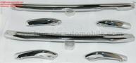 A new full set of genuine chrome bumpers for a Nissan Figaro displayed on a white surface