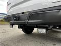 A 2016 Ford F-150 rear view showing the bumper hitch and two rectangular LED lights mounted below the tailgate