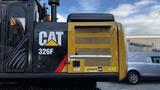 A 2018 Caterpillar 326F L Excavator featuring a black and yellow exterior with the CAT logo prominently displayed on its side