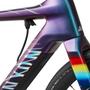 A 2025 Canyon Roadlite:ONfly CF MACH874 road bike featuring a colorful gradient frame with a sleek design and integrated cabling