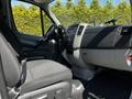 Interior view of a 2017 Mercedes-Benz Sprinter featuring a driver's seat and dashboard with controls and displays