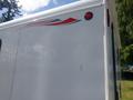 2004 Royal 18 Foot Office Trailer with a white exterior and red stripe design