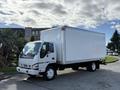 2007 GMC W5500 18 foot cube van with a white box body and a clean exterior parked on a roadway