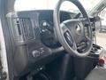 Interior view of a 2017 Chevrolet Express showing the steering wheel dashboard and control panel