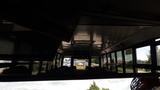 Interior view of a 2014 Freightliner Thomas Diesel bus showing empty seats and windows with a dashboard in the foreground