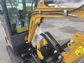 2024 AGT Industrial H13R Mini Excavator with an articulated arm featuring hydraulic hoses and a bucket attachment in the foreground