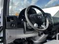 Interior view of a 2017 Mercedes-Benz Sprinter showing the steering wheel and dashboard with controls and gauges