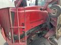 A red 2014 Toro Groundmaster 5910 with a distinctive design featuring the model name prominently displayed on the side and a large rear tire next to a protective frame