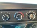 The image shows the climate control panel of a 2014 Chevrolet Express featuring three dials for fan speed temperature and air distribution settings