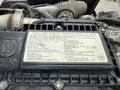 Close-up of a 2018 Hino 195 engine label displaying important engine information specifications and maintenance guidelines
