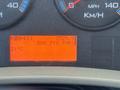 A digital dashboard display showing engine information including odometer reading of 2525.9 miles vehicle speed in kilometers per hour and engine temperature at 21 degrees Celsius