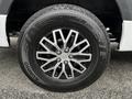 A close-up of a 2019 Mercedes-Benz Sprinter tire showcasing a black rim with silver accents and a Kumho Crugen HT51 tire