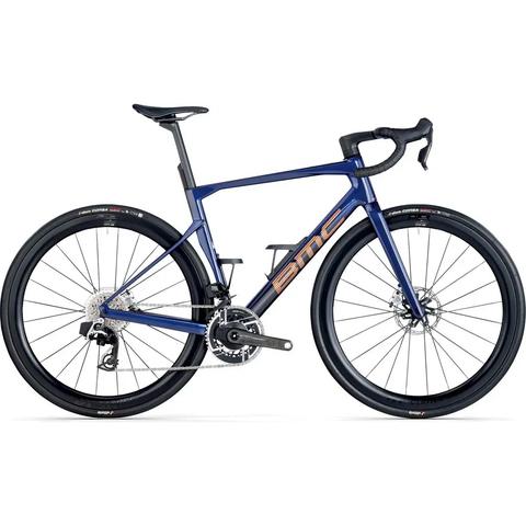 A blue 2026 BMC Roadmachine 01 ONE road bike with aerodynamic frame design disc brakes and high-performance components