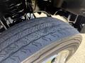 Close-up of a tire on a 2023 Ford F-550 showing the tread pattern and sidewall detail