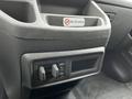 Interior view of a 2021 Ford Transit showing the control panel with buttons for adjustments and a no smoking sign displayed