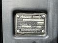 A metal identification plate for a Maxon lift attached to a 2017 Hino 338 truck displaying serial and model information