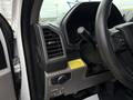 Cockpit view of a 2018 Ford F-550 with a focus on the dashboard controls and steering wheel