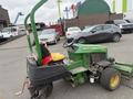 2009 John Deere 2653B Precision Diesel Mower with a green body and yellow wheels positioned in a parking area
