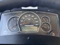 Dash of a 2009 Morgan Olson Workhorse W62 featuring speedometer tachometer and odometer displaying 122524.5 km