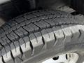 Close-up of a worn tire tread on a 2018 Ford Transit showing distinct grooves and patterns in the rubber surface