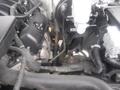 2015 Chevrolet Silverado 1500 engine compartment view showing various components including hoses and wiring without specific details of each part