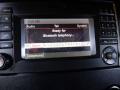The dashboard display of a 2016 Mercedes-Benz Sprinter showing a screen with options for audio and Bluetooth telephony settings