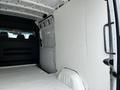 2012 Mercedes-Benz Sprinter with an empty cargo area featuring a white wall and a flat floor
