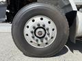 Close-up of a tire on a 2009 International 7500 showcasing the wheel rim and lug nuts