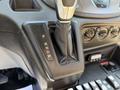 Gear shift lever in a 2017 Ford Transit with settings for park reverse neutral drive and low gear