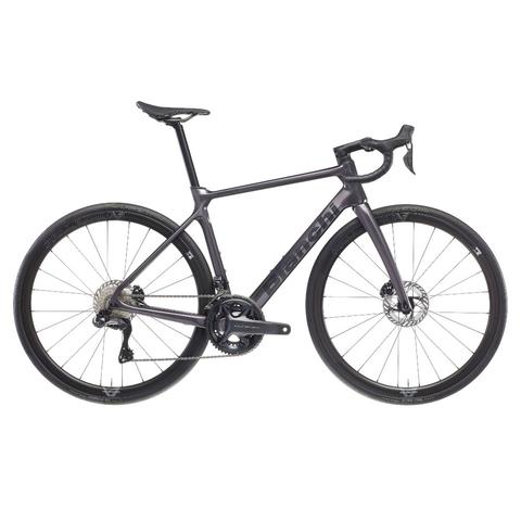 2026 Bianchi Infinito Shimano Ultegra Di2 12SP Carbon Endurance Road Bike with a sleek black frame disc brakes and thin tires designed for performance and endurance