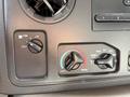 Control panel for climate settings in a 2019 Ford Econoline featuring fan speed and temperature adjustment dials