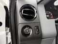 Close-up of the control panel in a 2016 Ford F-550 Super Duty featuring air vents and controls for headlights and dashboard lights