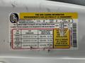 A tire information sticker from a 2022 Ford Transit displaying details on tire size, cold tire pressure, and seating capacity