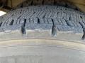 Close-up of a tire from a 2007 International 7300 showcasing the tread pattern and rubber texture