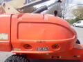 2008 JLG Boom Lift in orange color with a rounded body featuring control panels and identification numbers on the side