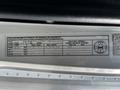 A vehicle information label showing specifications and details for a 2006 Hino 268 including weight and tire information