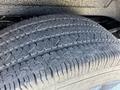 Close-up of a tire on a 2021 Chevrolet Express showing tread pattern and details of the rubber surface