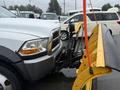 A 2011 Dodge Ram 5500 with a yellow snow plow attached to the front