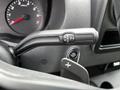 The gear selector lever of a 2023 Mercedes-Benz Sprinter showing options for reverse neutral and drive